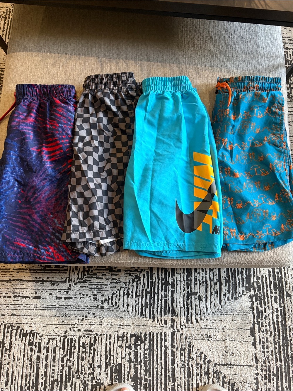 Set of 4  Boys' Swim Shorts 
Old Navy, Nike, Under Armour and Beach Bros